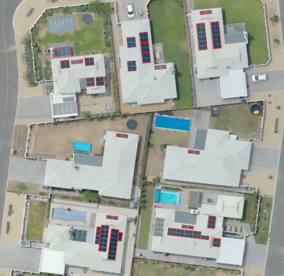Property-level solar panel detection - individual panel arrays identified and outlined per property